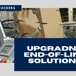 Title image featuring the inner workings of a case packing machine